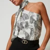 ceinture_rversible_avec_b_1.webp Ceintures*TWINSET Milano Ceinture Réversible Avec Boucle Oval T Bicolore Noir/Blanc « Old White »