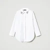 chemise_oversize_en_popel_1.webp Blouses Et Chemises*TWINSET Milano Chemise Oversize En Popeline Avec Broderies Blanc "Papers"