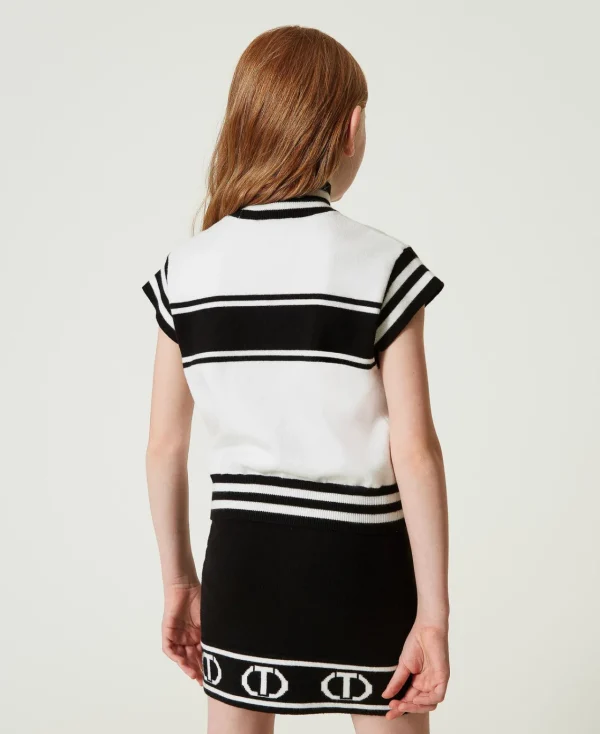jupe_courte_en_maille_ave_3.webp Jupes*TWINSET Milano Jupe Courte En Maille Avec Oval T Jacquard Bicolore Noir / Blanc Cassé