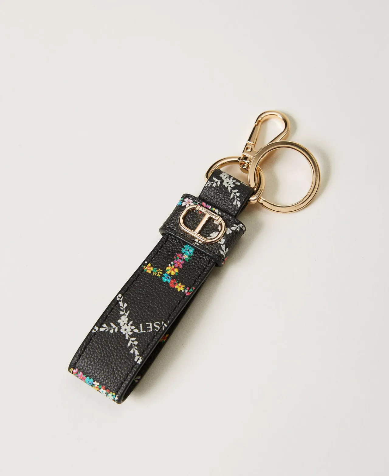 portecls_avec_oval_t_0.webp Portefeuilles Et Porte-Clés*TWINSET Milano Porte-clés Avec Oval T OVAL T Fleur et Twinset/Noir