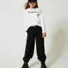 tshirt_cropped_avec_logo__4-1.webp T-Shirts Et Tops*TWINSET Milano T-shirt Cropped Avec Logo Brodé Bicolore Blanc Cassé / Noir