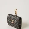 tui_pour_couteurs_avec_ov_0.webp Autres Accessoires*TWINSET Milano Étui Pour écouteurs Avec Oval T OVAL T Fleur et Twinset/Noir